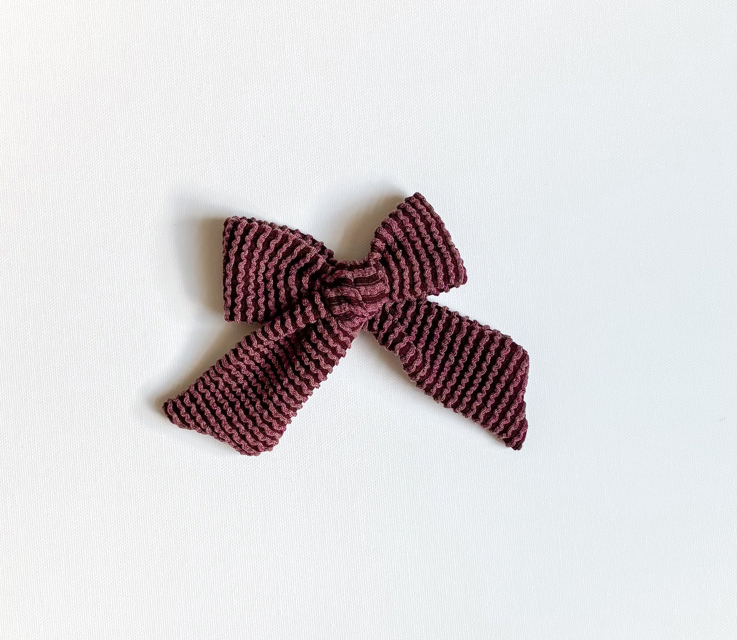 Maroon wavy bow clip