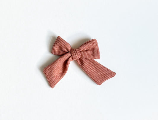 Copper bow clip
